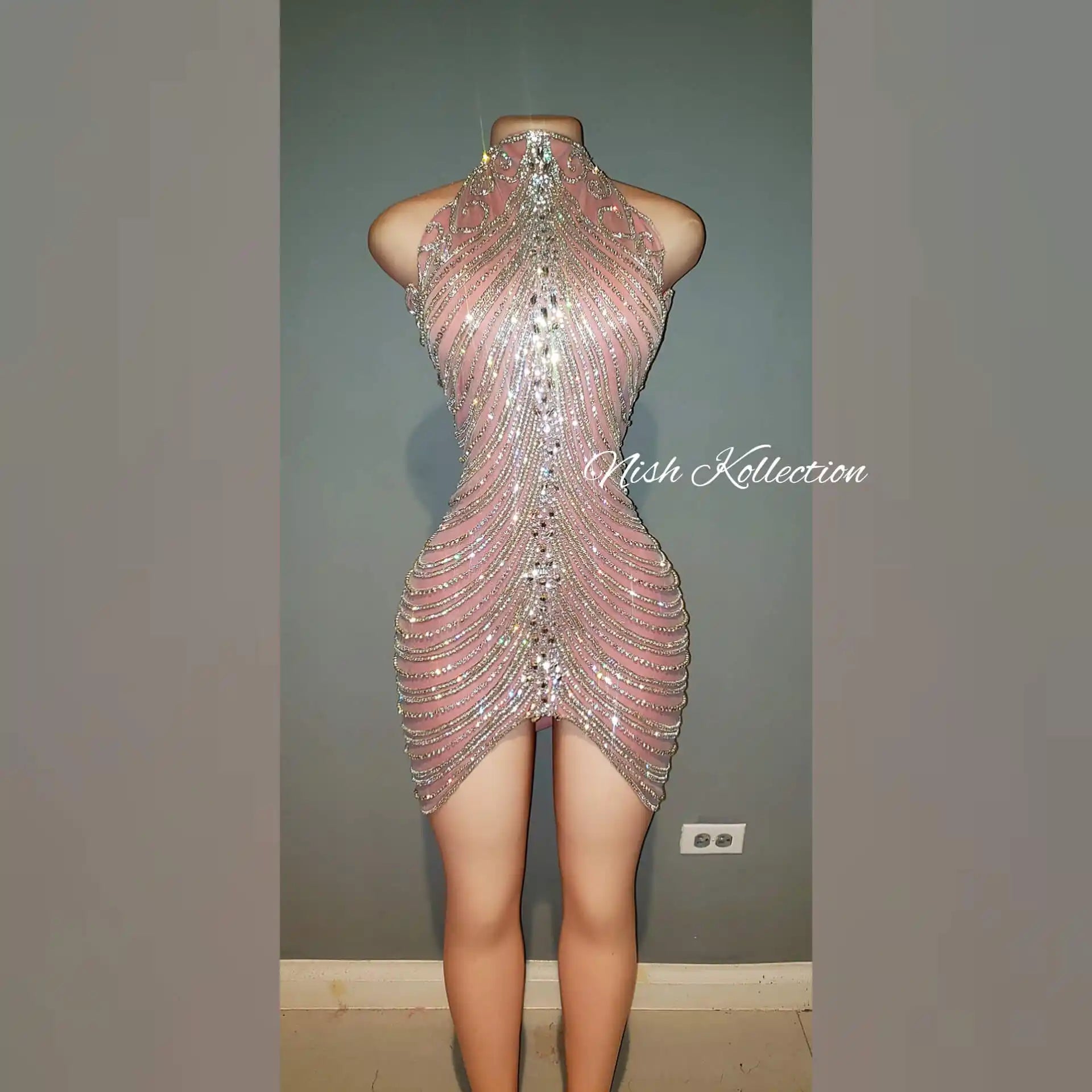 Front view of Diamond V Zena Rhinestone Dress with halter neckline and nude illusion base