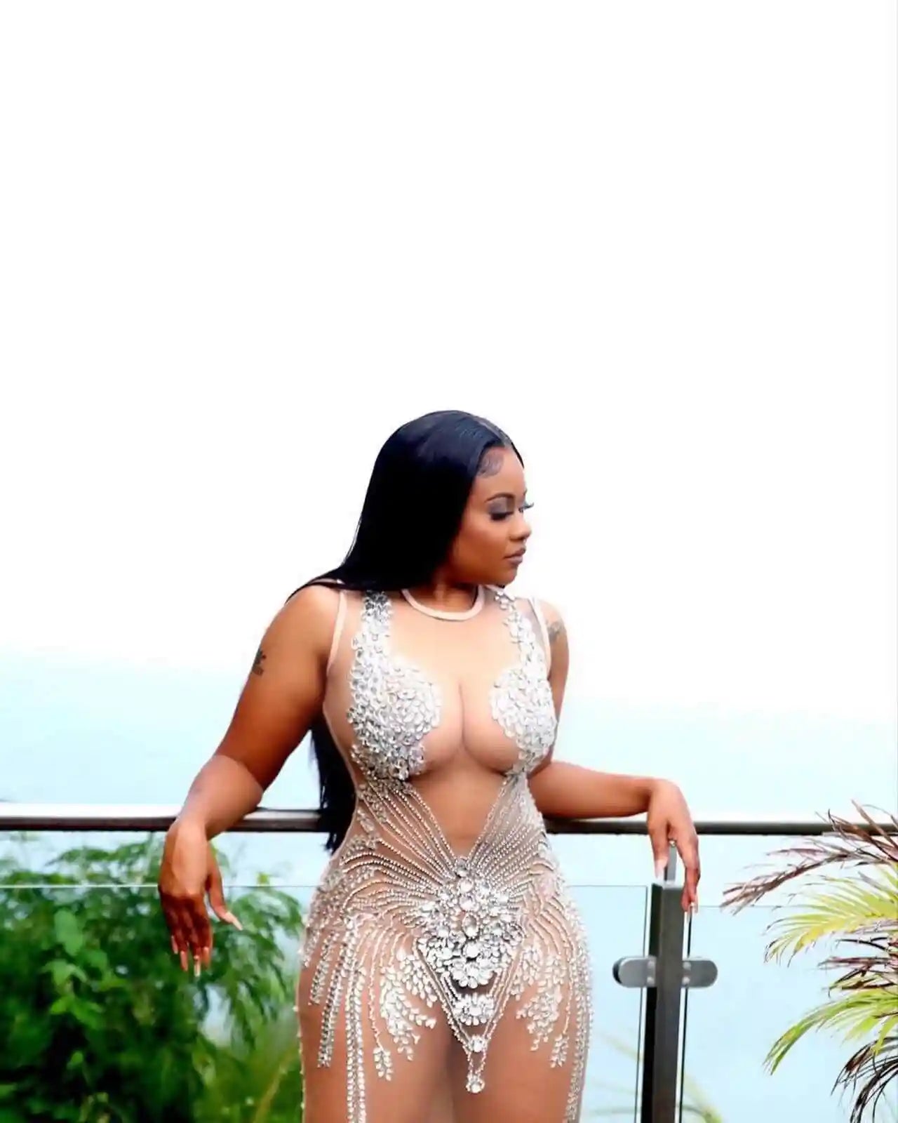 Model wearing London Rhinestone Mini Dress with sheer mesh and crystal detailing – front view