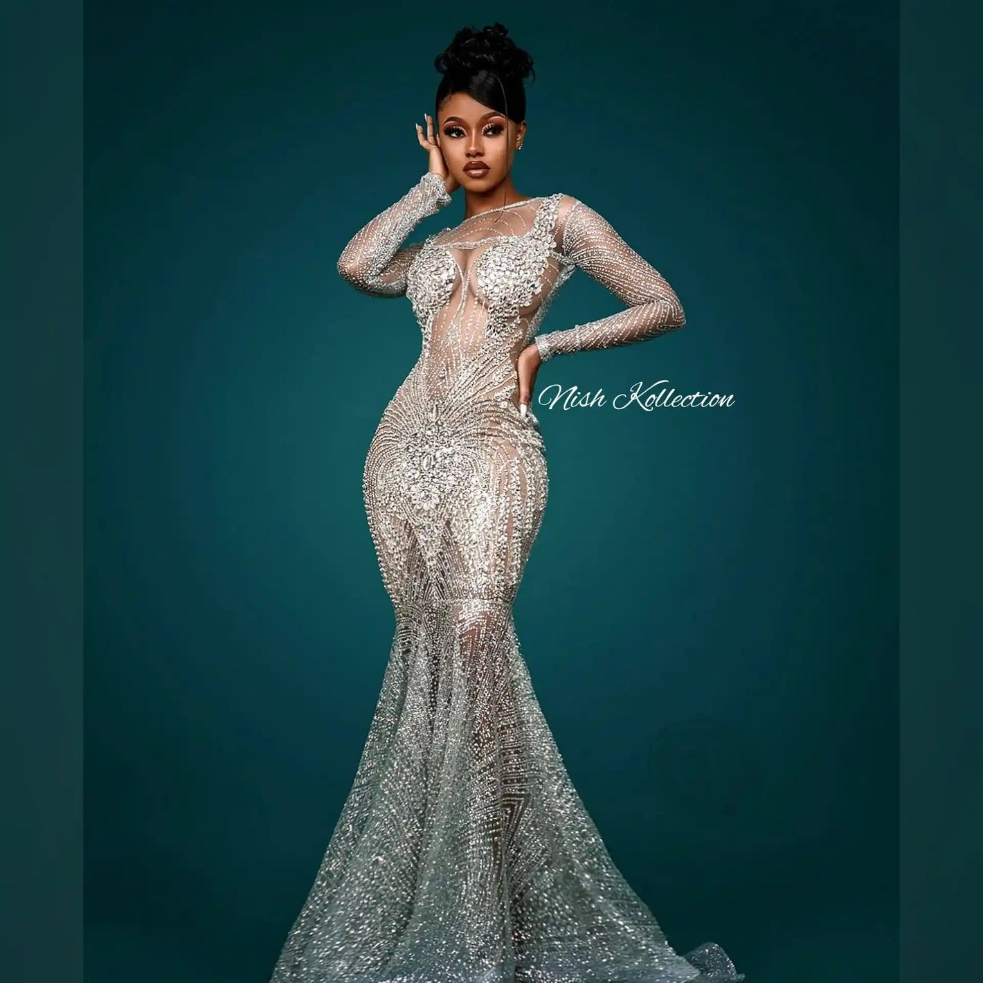 Model wearing London Shimmer Glitter Mermaid Dress with long sleeves and rhinestone details – front view