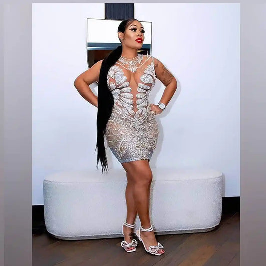 Model wearing Naijah Rhinestone Mini Dress in sheer crystal mesh – front view