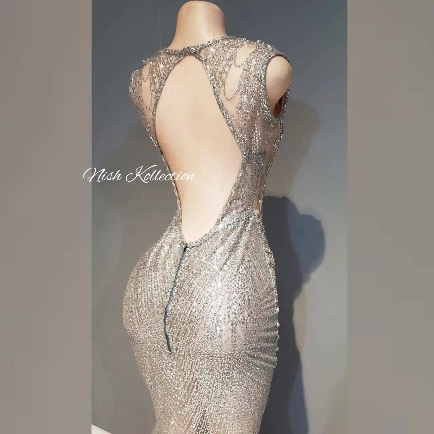 Back view of shimmer rhinestone dress with zip and open back