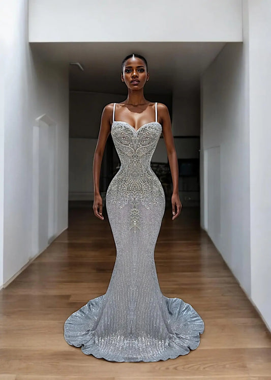 Full-length shot of elegant silver Viking mermaid dress on wooden floor